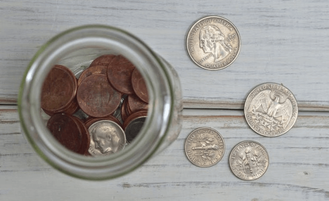 Brad Lea uses a quarter, nickel and dime to demonstrate active listening.